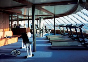 Fitness center with ocean views aboard Seabourn Quest luxury cruise ship