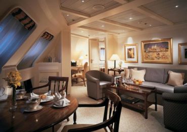 Luxury suite interior aboard Seabourn Quest with living area and ocean cruise accommodations
